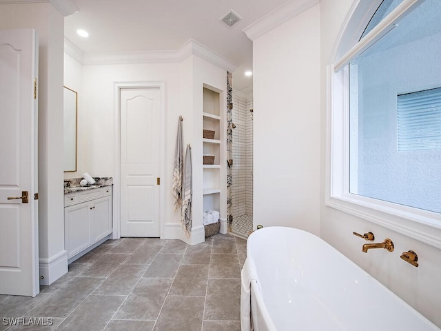 650 Bow Line Dr, Naples, FL 34103 - bathroom with a soaking tub, vanity, ornamental molding, tiled shower, and built in features