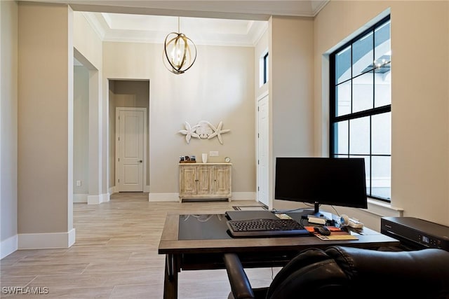 19720 Panther Island Blvd, Estero, FL 33928 - office space featuring ornamental molding, a towering ceiling, baseboards, light wood-style flooring, and a notable chandelier