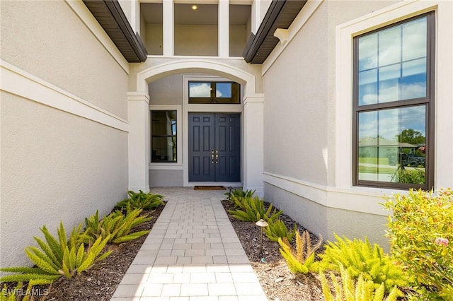 19720 Panther Island Blvd, Estero, FL 33928 - view of exterior entry with stucco siding