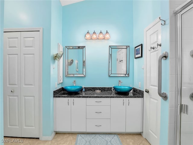 28796 Hunters Ct, Bonita Springs, FL 34135 - bathroom featuring double vanity, a sink, and a shower stall