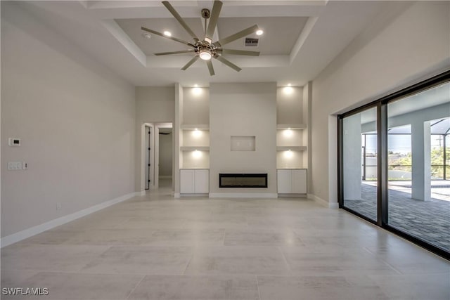 10 NW 13th Pl, Cape Coral, FL 33993 - unfurnished living room featuring a ceiling fan, visible vents, baseboards, a glass covered fireplace, and recessed lighting
