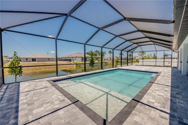 10 NW 13th Pl, Cape Coral, FL 33993 - outdoor pool featuring a water view, a patio area, a lanai, and a residential view
