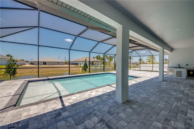 10 NW 13th Pl, Cape Coral, FL 33993 - pool featuring area for grilling, a lanai, and a patio area