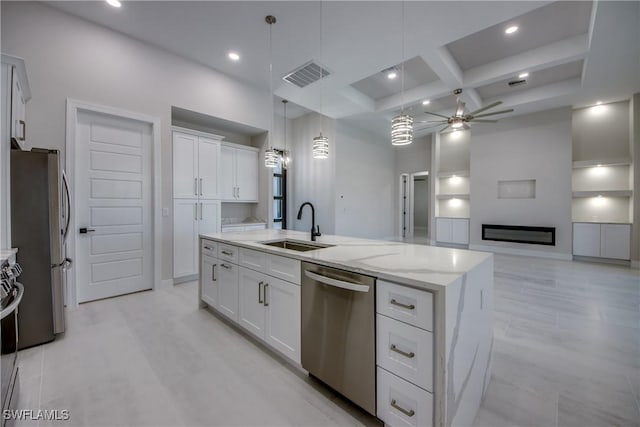10 NW 13th Pl, Cape Coral, FL 33993 - kitchen with a sink, an island with sink, stainless steel appliances, visible vents, and coffered ceiling