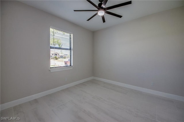 10 NW 13th Pl, Cape Coral, FL 33993 - empty room featuring ceiling fan and baseboards