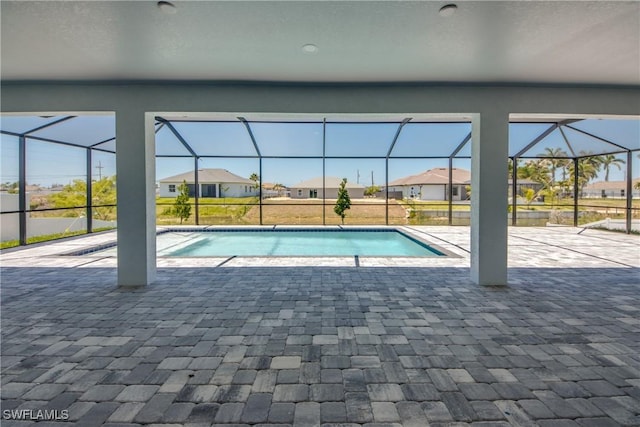 10 NW 13th Pl, Cape Coral, FL 33993 - pool with a residential view, glass enclosure, and a patio area