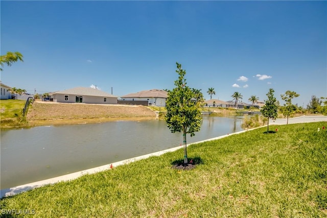 10 NW 13th Pl, Cape Coral, FL 33993 - property view of water featuring a residential view