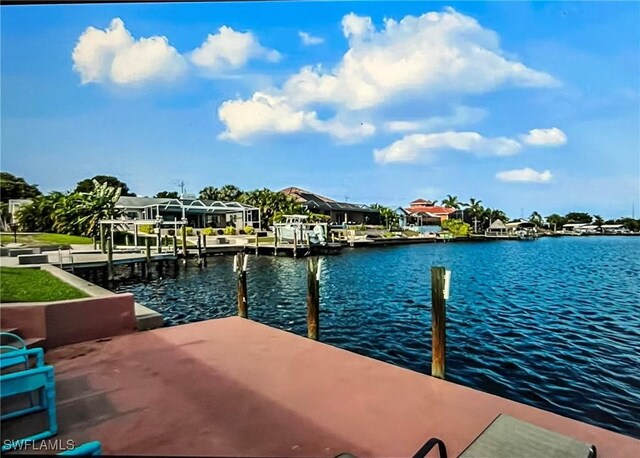 717 SW 49th Ln, Cape Coral, FL 33914 - dock with a water view