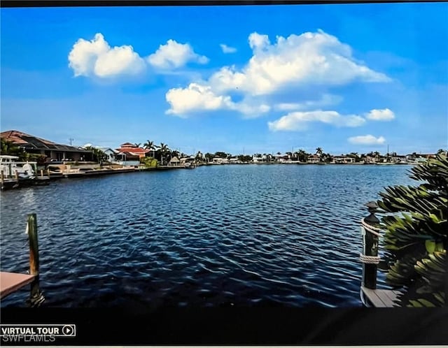 717 SW 49th Ln, Cape Coral, FL 33914 - dock area featuring a water view