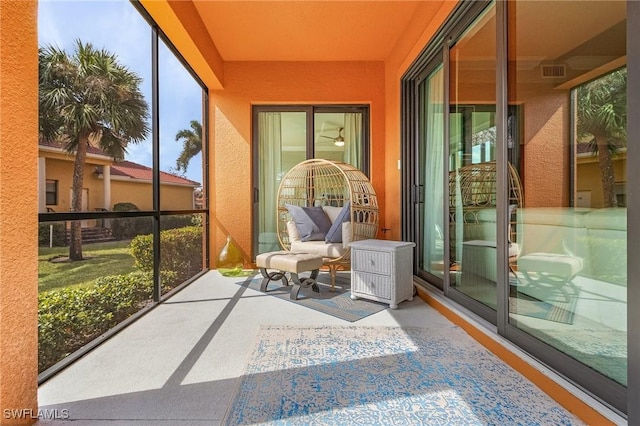 sunroom / solarium featuring visible vents