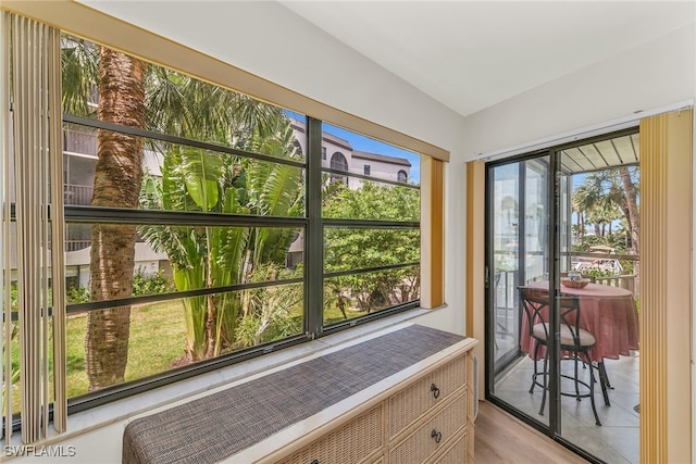 sunroom / solarium with lofted ceiling