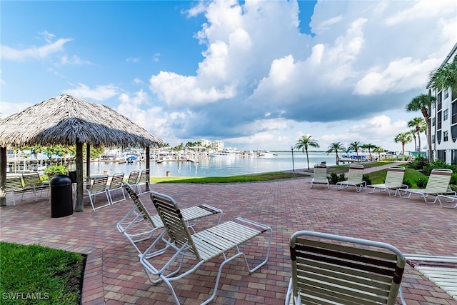 view of patio / terrace with a water view