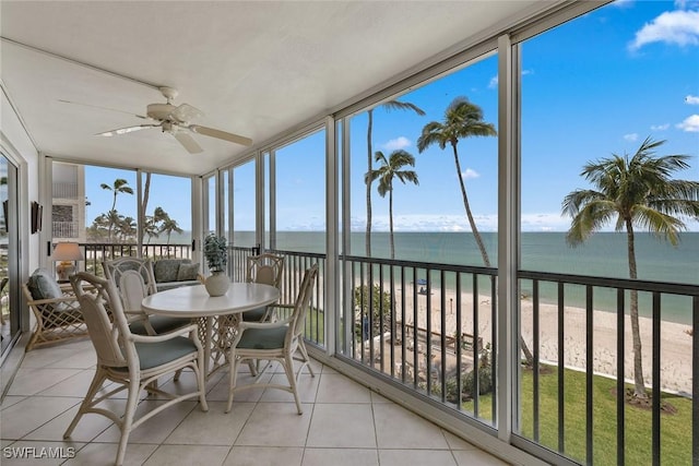 1275 Gulf Shore Blvd N Unit 301, Naples, FL 34102 - sunroom / solarium with a beach view, a water view, and tile patterned floors
