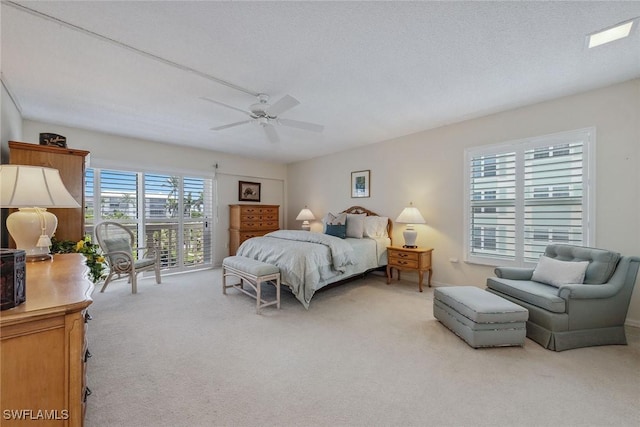 1275 Gulf Shore Blvd N Unit 301, Naples, FL 34102 - bedroom with light carpet and a ceiling fan