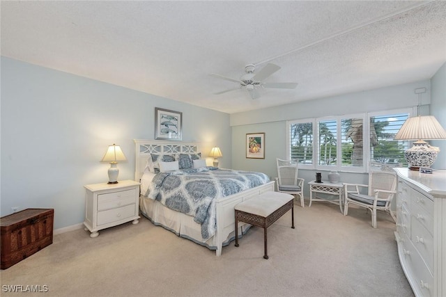 1275 Gulf Shore Blvd N Unit 301, Naples, FL 34102 - bedroom featuring light carpet and a ceiling fan