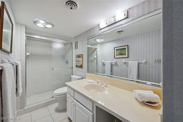 1275 Gulf Shore Blvd N Unit 301, Naples, FL 34102 - full bath with vanity, toilet, tile patterned floors, visible vents, and a stall shower