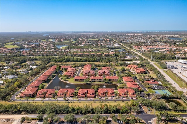 bird's eye view with a water view and a residential view