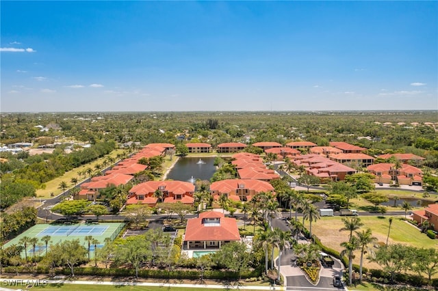 aerial view featuring a water view and a residential view