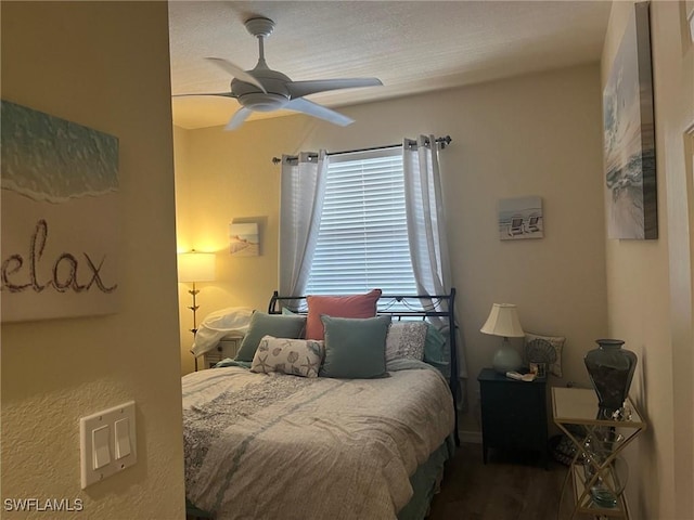 9631 Spanish Moss Way Unit 3931, Bonita Springs, FL 34135 - bedroom with wood finished floors and a ceiling fan
