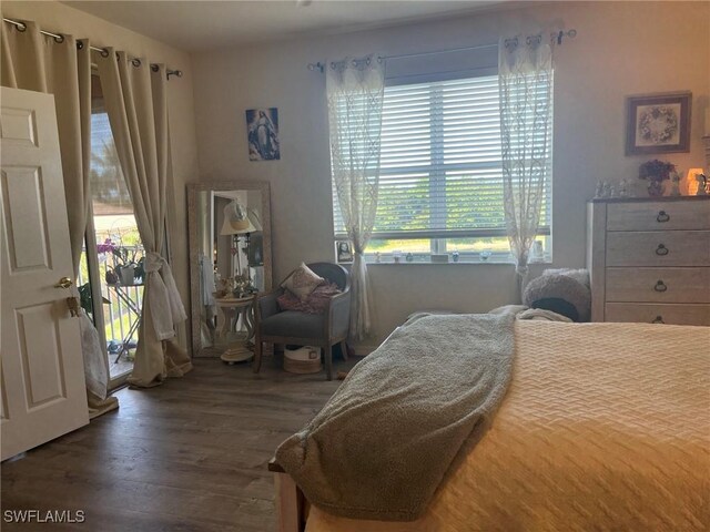 bedroom with wood finished floors