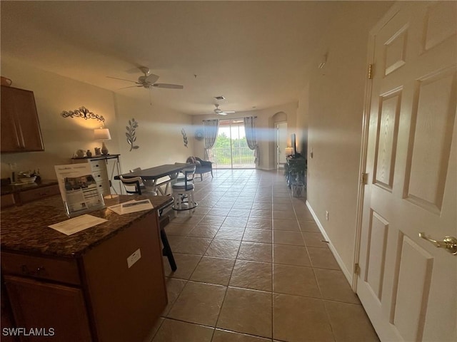 9631 Spanish Moss Way Unit 3931, Bonita Springs, FL 34135 - hallway featuring tile patterned flooring and baseboards