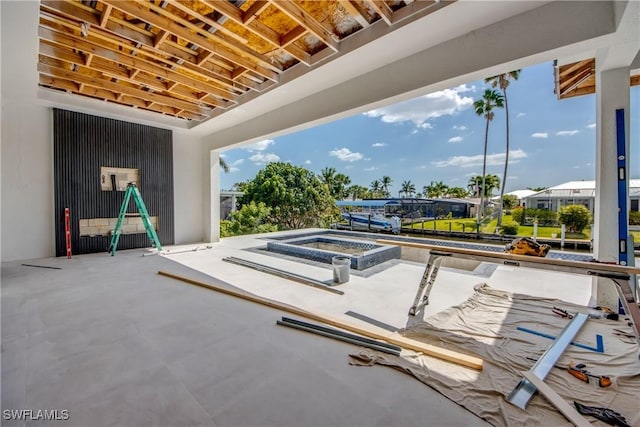 exterior space featuring a hot tub