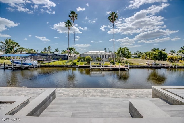 dock area with a water view