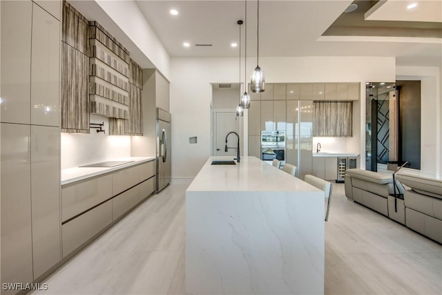 kitchen with a sink, modern cabinets, stainless steel appliances, and wine cooler
