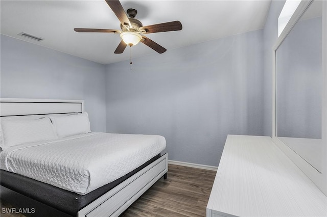 4004 Chiquita Blvd S, Cape Coral, FL 33914 - bedroom with visible vents, ceiling fan, dark wood-style floors, and baseboards