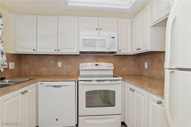 kitchen featuring a sink, white cabinetry, backsplash, and white appliances