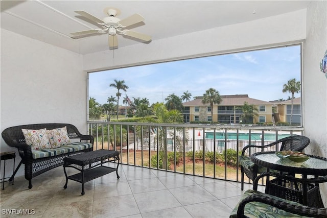 balcony featuring ceiling fan