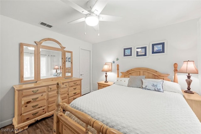 6012 Perthshire Ln, Fort Myers, FL 33908 - bedroom with dark wood-type flooring, baseboards, and a ceiling fan