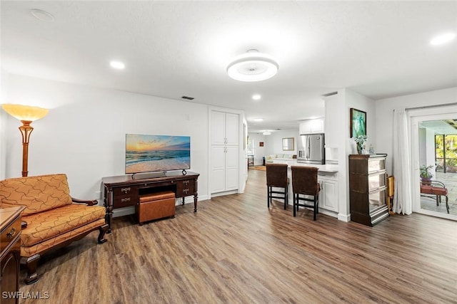6012 Perthshire Ln, Fort Myers, FL 33908 - living area featuring wood finished floors, recessed lighting, and baseboards