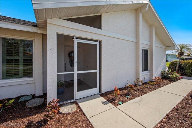 6012 Perthshire Ln, Fort Myers, FL 33908 - property entrance with stucco siding