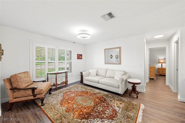 6012 Perthshire Ln, Fort Myers, FL 33908 - living area with wood finished floors and baseboards