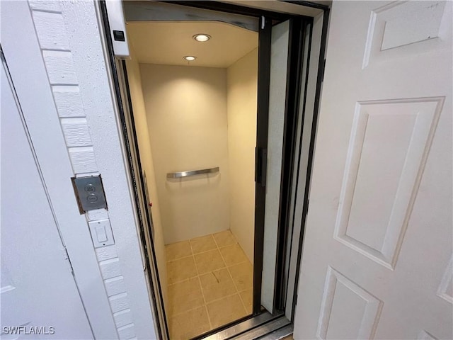 8315 Main St, Bokeelia, FL 33922 - interior details featuring recessed lighting and elevator