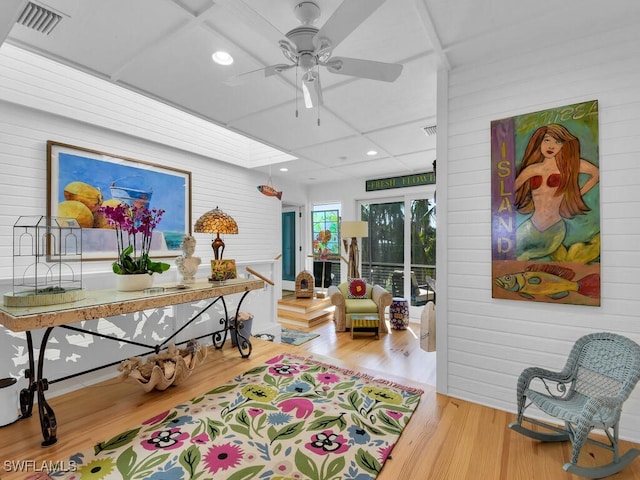 8315 Main St, Bokeelia, FL 33922 - interior space with visible vents, wood walls, wood finished floors, recessed lighting, and a ceiling fan