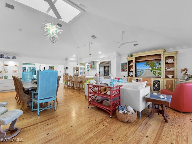 8315 Main St, Bokeelia, FL 33922 - living room featuring a skylight, ceiling fan, and visible vents