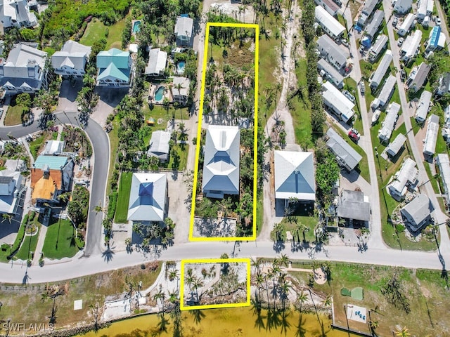 8315 Main St, Bokeelia, FL 33922 - drone / aerial view featuring a residential view