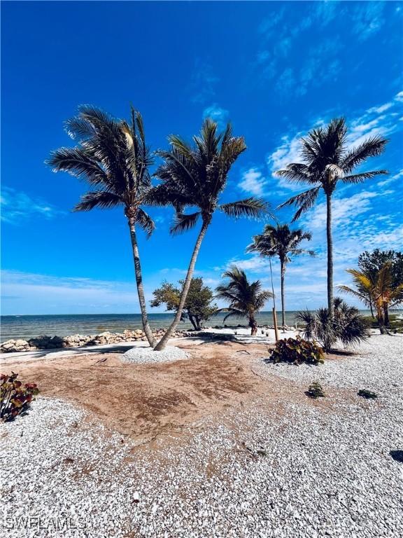 8315 Main St, Bokeelia, FL 33922 - property view of water featuring a beach view