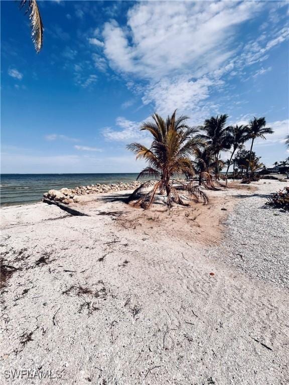 8315 Main St, Bokeelia, FL 33922 - property view of water featuring a view of the beach