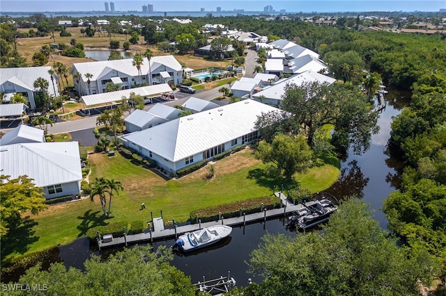 15400 River Vista Dr Unit 304, North Fort Myers, FL 33917 - drone / aerial view with a water view and a residential view