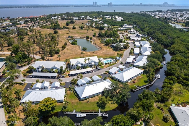 15400 River Vista Dr Unit 304, North Fort Myers, FL 33917 - aerial view featuring a water view and a residential view