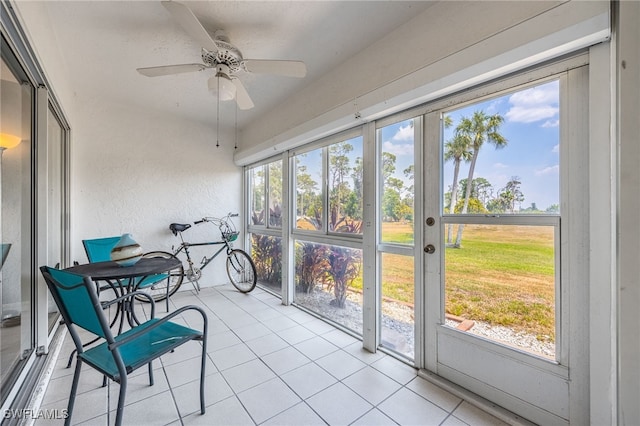 15400 River Vista Dr Unit 304, North Fort Myers, FL 33917 - sunroom / solarium featuring a ceiling fan