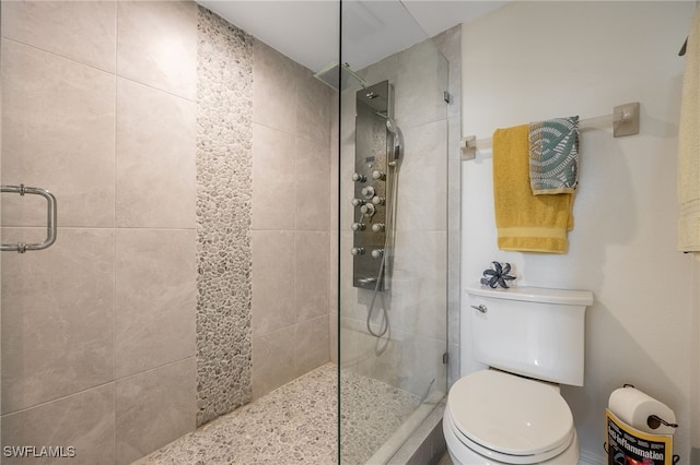 15400 River Vista Dr Unit 304, North Fort Myers, FL 33917 - bathroom with a tile shower and toilet