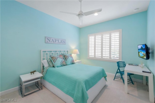 9052 Graphite Cir, Naples, FL 34120 - bedroom with carpet flooring, baseboards, and ceiling fan