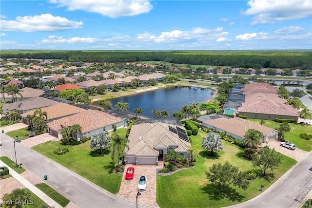 9052 Graphite Cir, Naples, FL 34120 - aerial view of residential area featuring a nearby body of water