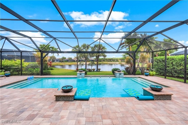 9052 Graphite Cir, Naples, FL 34120 - outdoor pool featuring a water view, a patio area, and a lanai