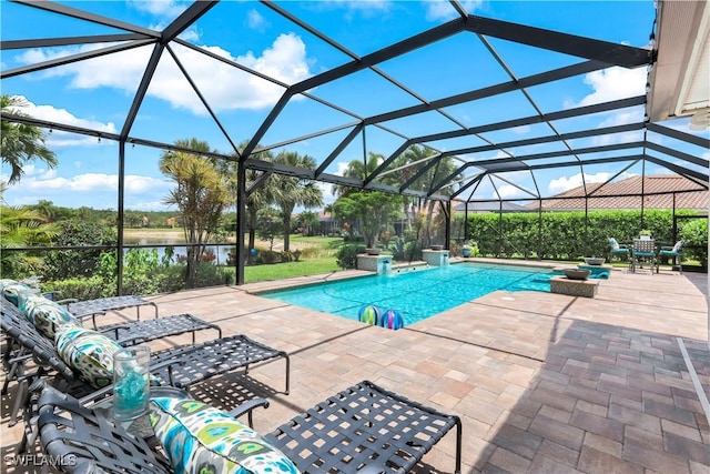 9052 Graphite Cir, Naples, FL 34120 - swimming pool featuring a water view and a patio area