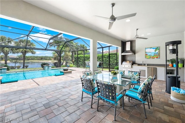 9052 Graphite Cir, Naples, FL 34120 - view of patio / terrace featuring a sink, an outdoor pool, outdoor dining area, a water view, and glass enclosure